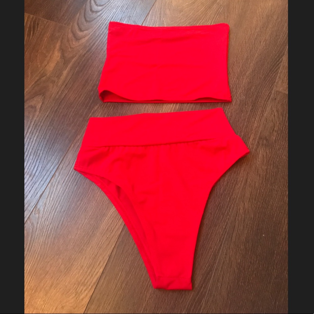Two piece red swim wear. Woman's size: Small